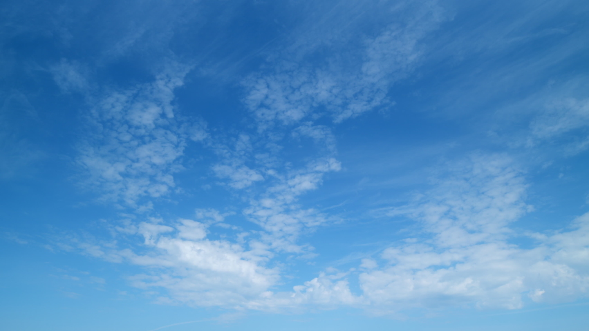 Sky with bautiful silky clouds. Puffy fluffy cirrus clouds. Timelapse. Royalty-Free Stock Footage #1095086131