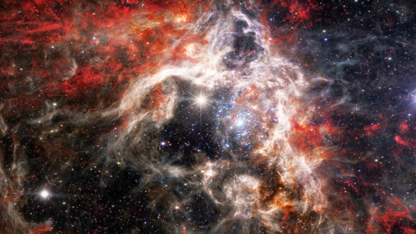 Tarantula Nebula, 30 Doradus, NGC 2070, Star-forming region in the deep space. Gas accumulation in outer space. James webb telescope. Space landscape. JWST. Elements of this image furnished by NASA. Royalty-Free Stock Footage #1095107265