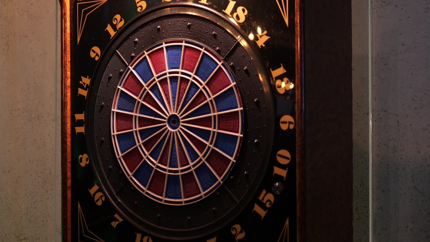 Dartboard used for darts or dart-throwing game Royalty-Free Stock Footage #1095112467