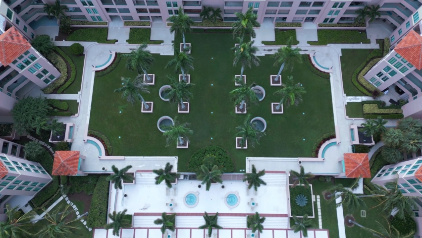 Aerial View of Modern Upscale Condo Complex, Pool and Dock in Boca Raton, Florida USA, Real Estate Concept, Drone Shot