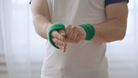 Funny sequence of fitness freak getting ready for training, wearing accessories - Powered by Shutterstock - Get 15% off with code: PIKWIZARD15