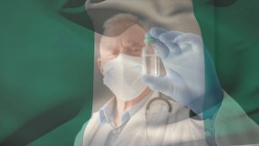Animation of flag of nigeria waving over doctor wearing face mask and holding vaccine. global medicine, healthcare services during covid 19 pandemic concept digitally generated video.