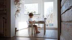 Little 5 year boy is filming his game of building constructor blocks on his smartphone. The child is broadcasting video to social networks. Kid blogger communicates with his online audience. Blogging. - Powered by Shutterstock - Get 15% off with code: PIKWIZARD15