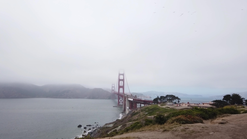 DOLLY SHOT - View of the Golden Gate Bridge from the Battery Bluff Trail View Point in San Francisco, California, USA.