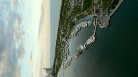 Vertical aerial drone footage Haulover Park Miami and parking lot 4k