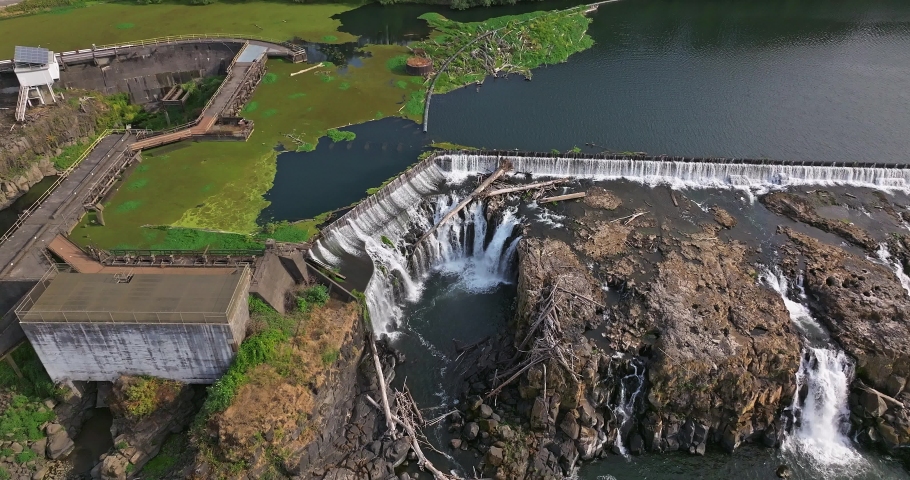 Willamette Falls Oregon City Oregon.   It is the largest waterfall in the Northwestern United States by volume, and the seventeenth widest in the world.  Horseshoe in shape, it is 1,500 feet wide.
