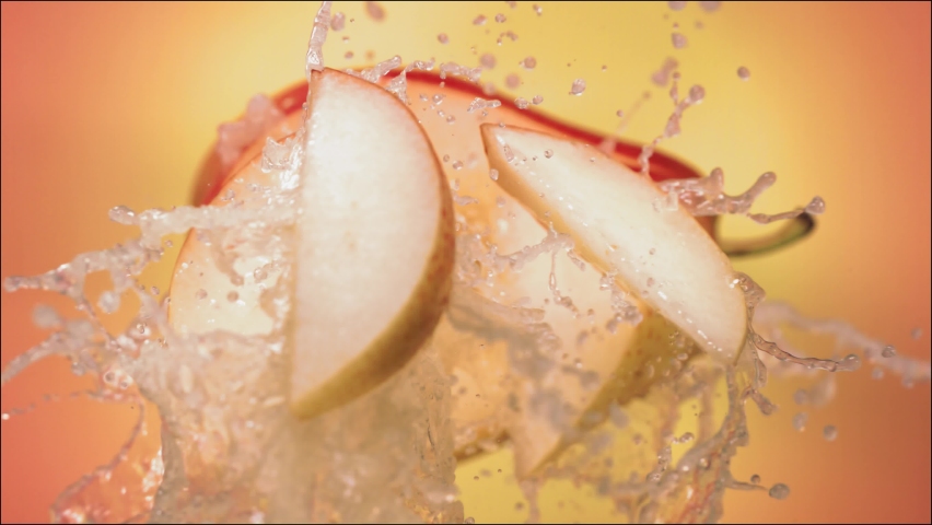 Super Slow Motion of Explosion Pear and Burst Juice and Slices - Powered by Shutterstock - Get 15% off with code: PIKWIZARD15