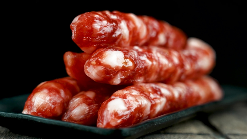 Cantonese style cooking of claypot rice with waxed meats