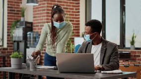 African american people doing teamwork to analyze business information on laptop, working on project during covid 19 pandemic. Team of coworkers planning online research report. - Powered by Shutterstock - Get 15% off with code: PIKWIZARD15