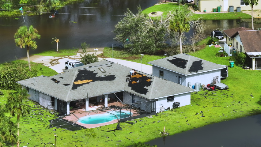 Hurricane Ian destroyed house roof in Florida residential area. Natural disaster and its consequences Royalty-Free Stock Footage #1095177759
