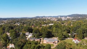 4K Drone Video (dolly shot) of Neighborhoods on the South Side of Downtown Asheville, NC on Sunny Summer Day - 03
