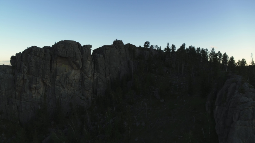 Dramatic ascent and reveal shot over South Dakota State Park 