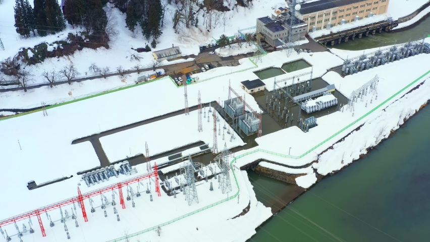 Aerial view of electric power facilities buried in snow.