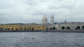 Cityscape of Saint Petersburg city, Russia. Church of Saint Catherine of Alexandria in the background. Grey rainy cloudy sky. Real time video. Travel in Russia theme.