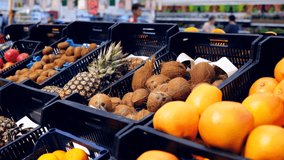 Pineapples and coconuts on the supermarket counter - Powered by Shutterstock - Get 15% off with code: PIKWIZARD15