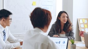 Group of Asian business people brainstorm meeting on project and share idea to colleague during meeting at office - Powered by Shutterstock - Get 15% off with code: PIKWIZARD15