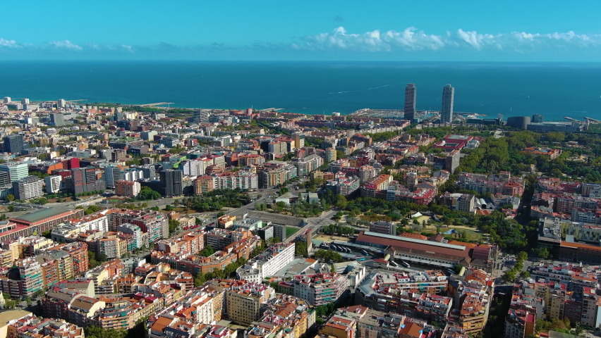 Aerial view of Barcelona city skyline during a sunny day. Catalonia, Spain. Barcelona Port Olimpic, Ciutadella, Vila Olimpica. Port with boats near the coast