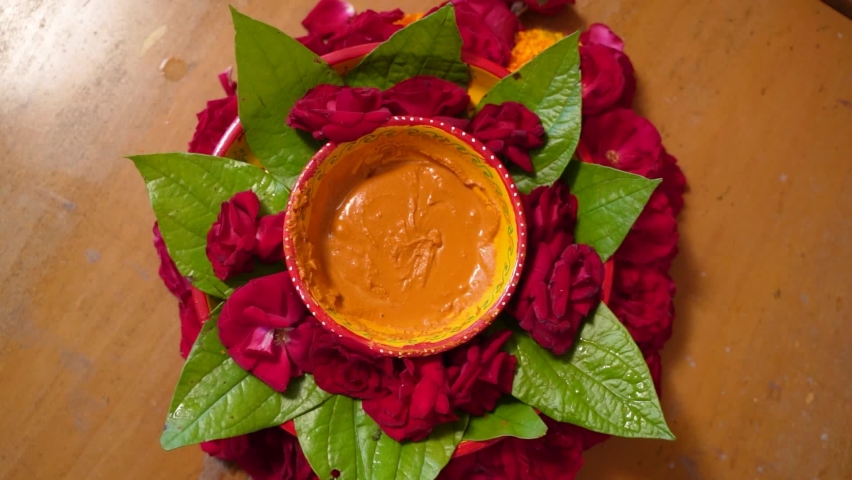 Haldi - Turmeric Paste for Haldi Ceremony, Indian Hindu Wedding Ritual  Royalty-Free Stock Footage #1095210435