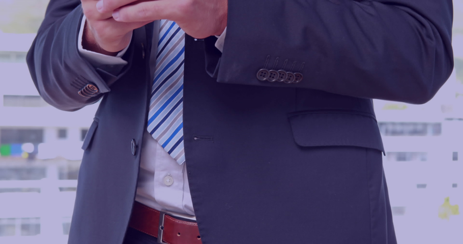 Animation of email icons in circles over caucasian businessman with smartphone. Network, data security and digital safety concept digitally generated video.