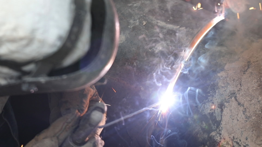 Welding for joining Two Pipe-Welded joints-Butt welds (Tie In Operation) Royalty-Free Stock Footage #1095219613