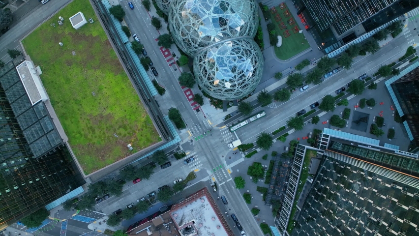 Unique rising and rotating aerial shot of the Amazon Spheres in Seattle's downtown area. Royalty-Free Stock Footage #1095220563
