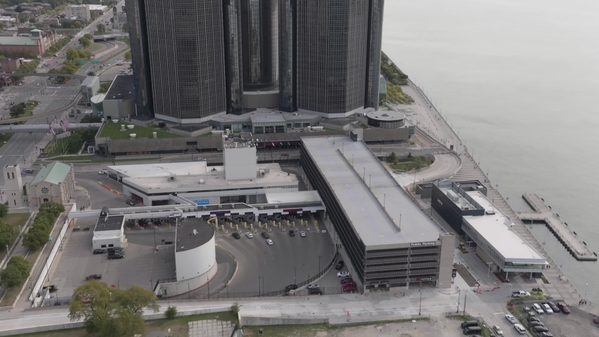 Detroit , Michigan , United States - 10 01 2022: Renaissance Center in and tilt up Aerial 4K