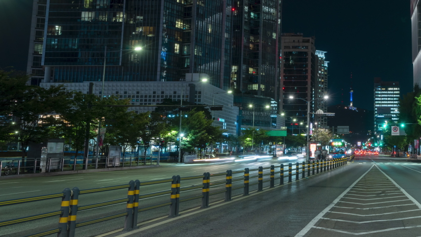 Busy Bus Stop Traffic NIght Time Lapse in Seoul City Downtown, Sinyongsan Station, South Korea
