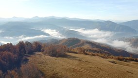 Spectacular view from the drone in the morning mountains. Location place Carpathian mountains, Ukraine, Europe. Cinematic aerial shot. Discover the beauty of earth. Filmed in UHD 4k, drone video.