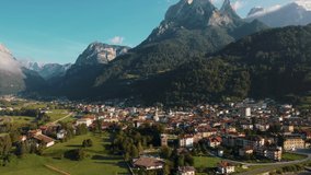 City of Agordo in Italy, surrounded by mountain peaks, beautifull green valeys.