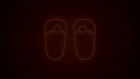Glowing neon line Flip flops icon isolated on black background. Beach slippers sign. 4K Video motion graphic animation.