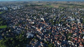 Aerial view around the city Brumath in France on a late sunny afternoon	
