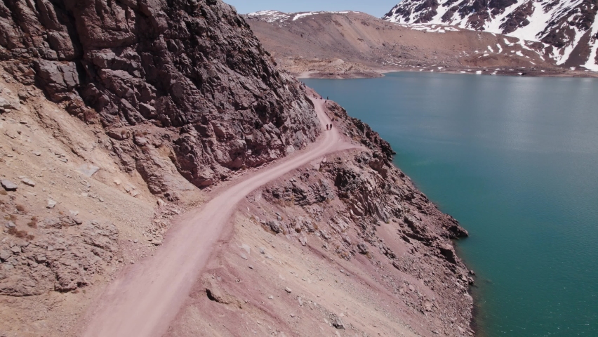 Tourists At El Yeso Dam, Andes Mountains, Santiago Metropolitan Region, Chile - aerial drone shot Royalty-Free Stock Footage #1095269793