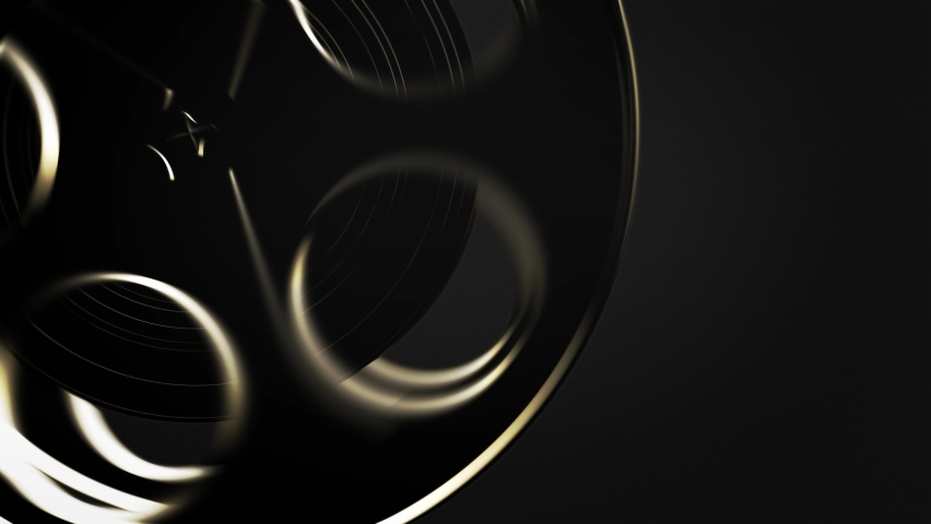 Movie tape, graphics composition element. Reel tape spool rolling in a dark classic cinema concept. CG close up shot, ideal for movie show intros or logos