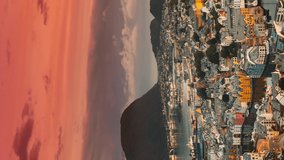 Alesund, Norway. Day To Night Time-lapse. Dramatic Sky In Warm Colours Above Alesunds Islands In Sunset Time. 4K. Famous Town In Evening Night Time. Vertical, Vertical Shot, Vertical Video,