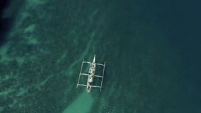 Drone footage of a boat in the ocean in the Philippines