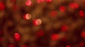 Animation of christmas fairy lights flickering over christmas tree background. Christmas, festivity, celebration and tradition concept digitally generated video.