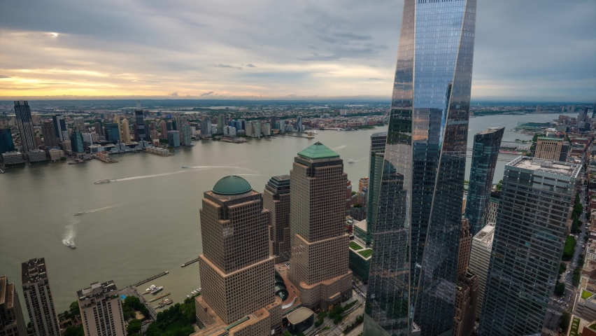 Daylight Rooftop View Time-lapse of Busy traffic on Hudson River and Lower Manhattan | Shutterstock HD Video #1095337787