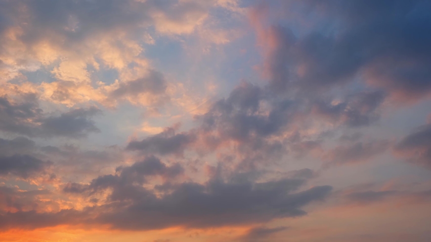 4K UHD : sky timelapse, Burning sky and shining, Red purple orange blue pink. Romantic colorful sky and sunrise clouds. winter sky

