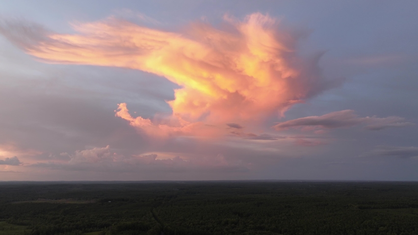 Clouds above Forest During Sunset