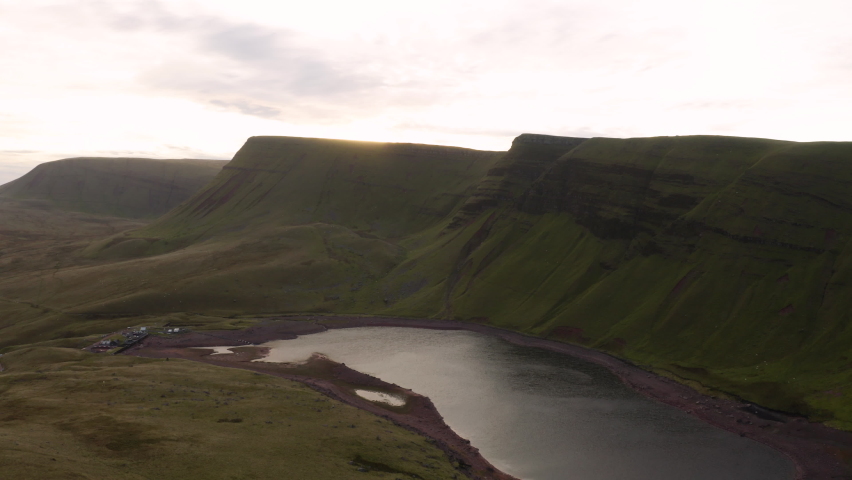 Llyn y fan Fach Brecon beacons. Wales mountain valley countryside lake wilderness Aerial. Aerial view of a natural lake (Llyn y Fan Fach, Wales). United Kingdom. UK. England. 