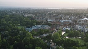 Establishing Aerial View Shot of Cambridge UK, academic city, Cambridgeshire ,United Kingdom, hazy morning, Kings College