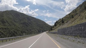 Video of driving in a car In summer season along the mountain road in Altai. Siberia, Russia