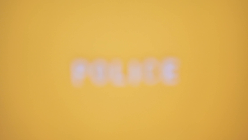 done by the police lettering decorated with a yellow background