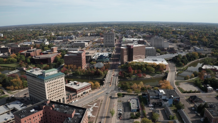 Flint, Michigan skyline wide shot with drone video moving forward.