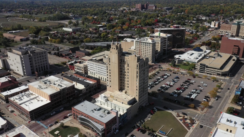 Downtown Flint, Michigan skyline with drone video circling.