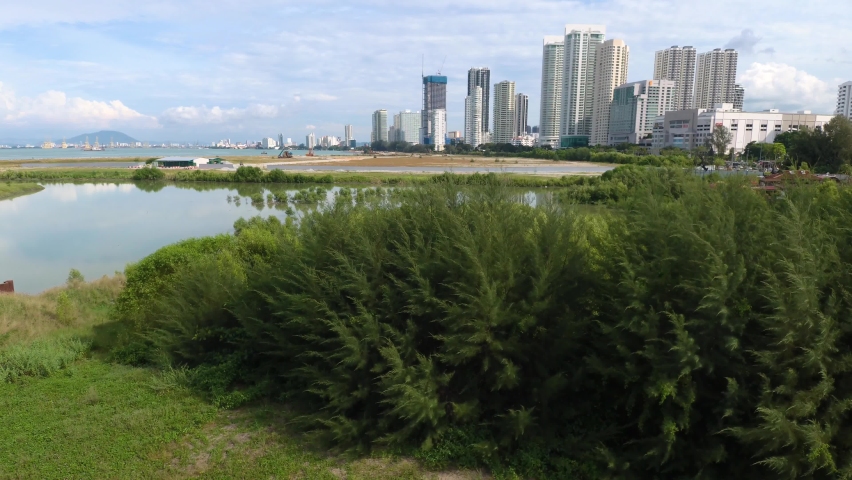 Penang Aerial View Cityscape with buildings, river and mountains, Touristic place in Malaysia and Asia