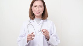 Asian doctor talking with patient via laptop computer, Medical online