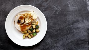 Eating Pork Roast with Mashed Potatoes and Gravy - Powered by Shutterstock - Get 15% off with code: PIKWIZARD15