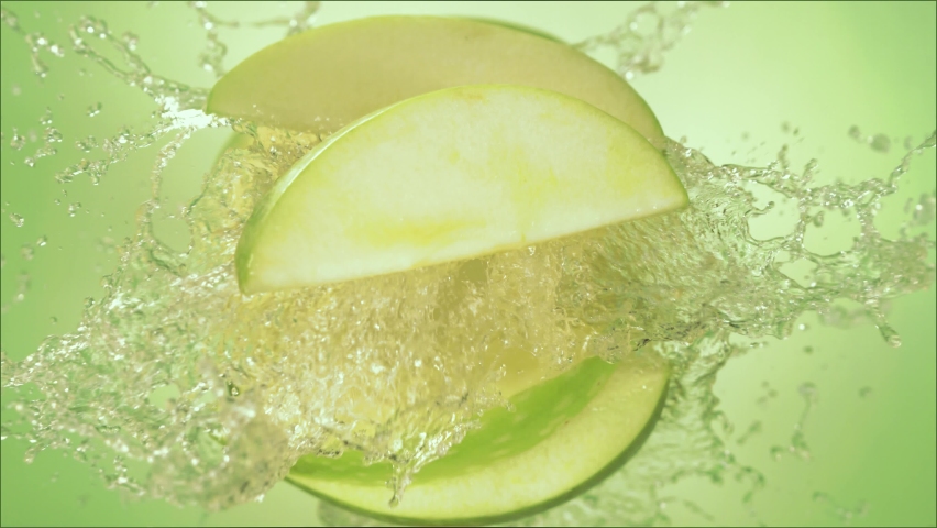 Super Slow Motion of Explosion Green Apple and Burst Juice and Slices - Powered by Shutterstock - Get 15% off with code: PIKWIZARD15