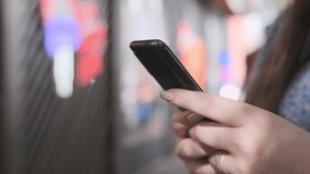Women holding cell phone using smartphone device in a street cafe. Woman blogger subscribing new social media, buying in internet, ordering products online in apps. - Powered by Shutterstock - Get 15% off with code: PIKWIZARD15